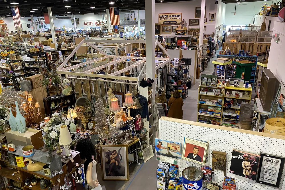 Looking out over the booths and shelves from the mezzanine